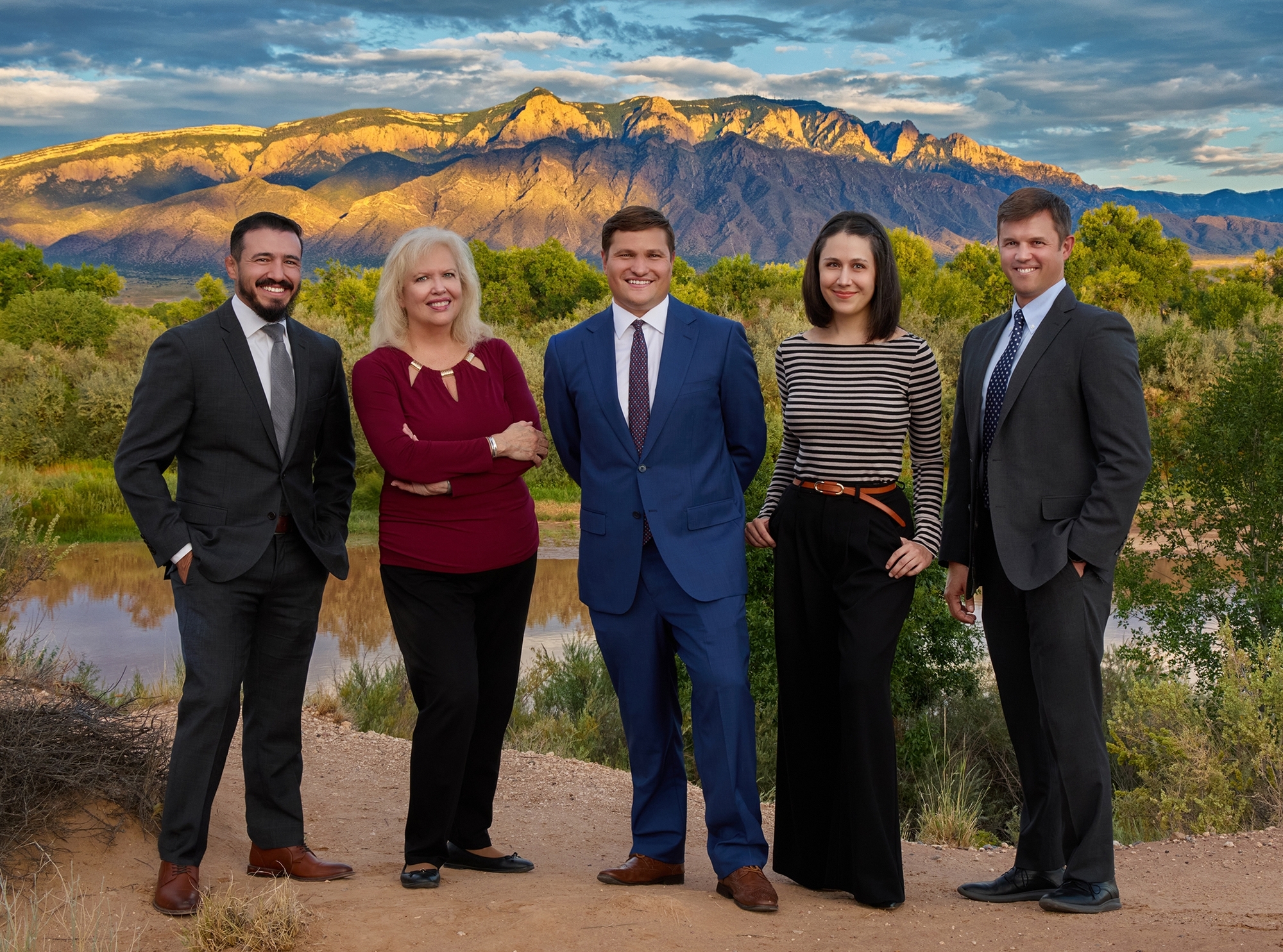 team photo with mountains in the background